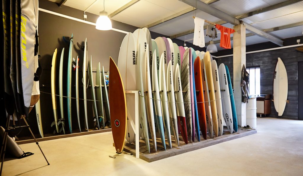 a store with a selection of surfboards