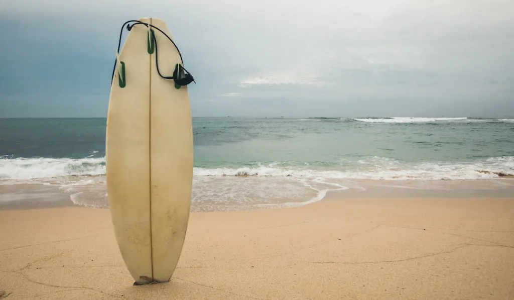 old surfboard at the beach