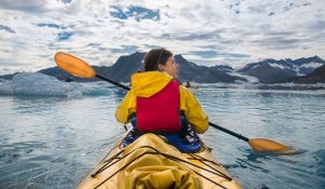 woman looking at the mountains while kayaking - ss220324