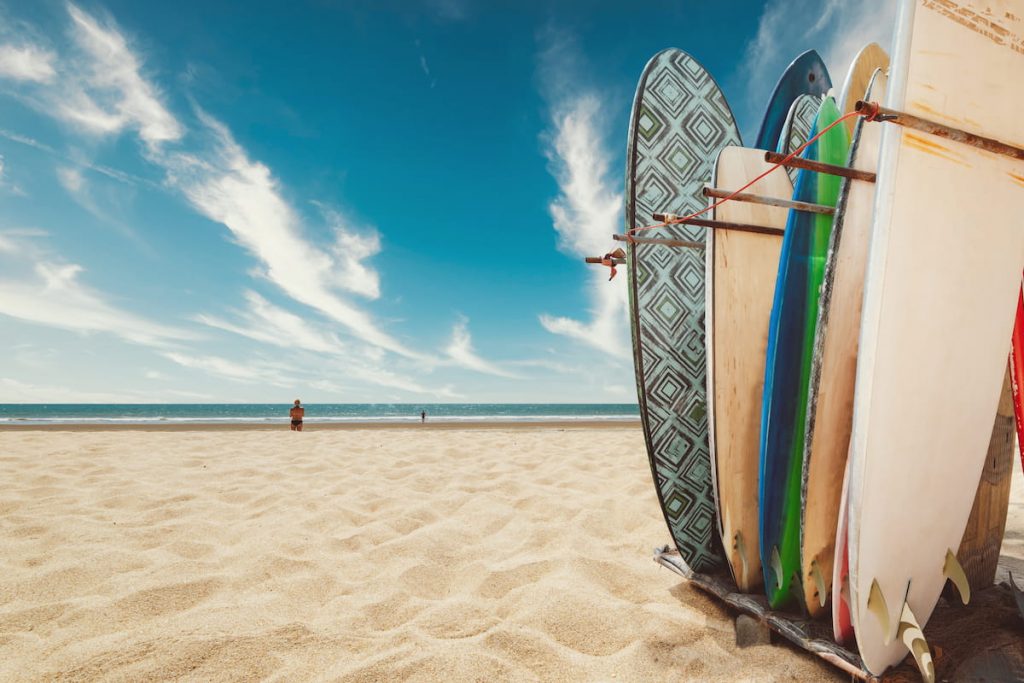 Surfboard on tropical beach in summer