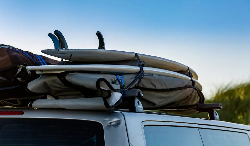 Surfboards fixed on a top of a car