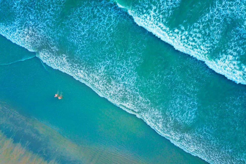 Top view of a beautiful beach with people