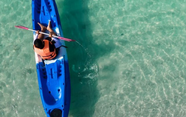 aerial view of man in floating kayak - ss220816