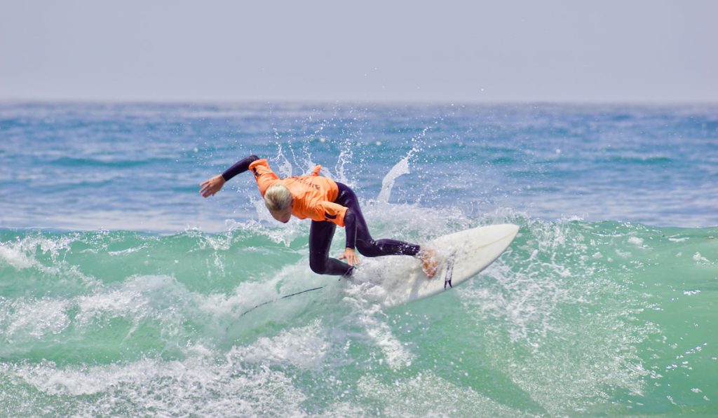 surfer shredding a wave in southern california
