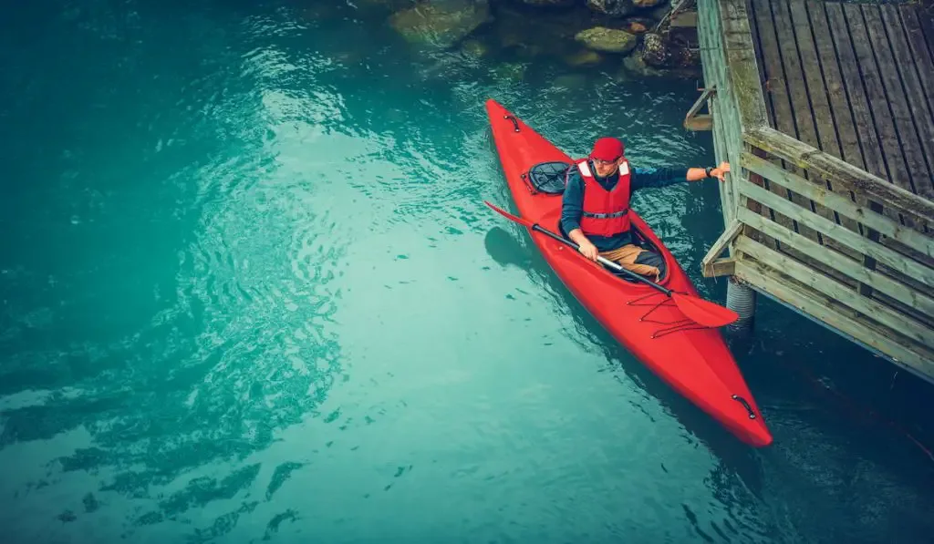 man in kayak ready to take a scenic kayak tour