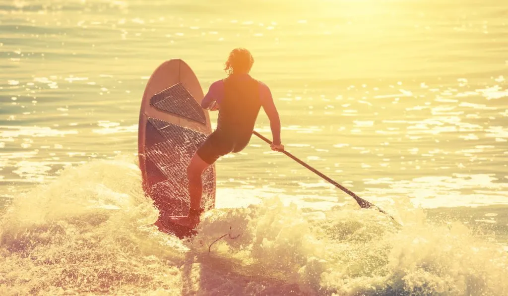 active surfer on paddle board 