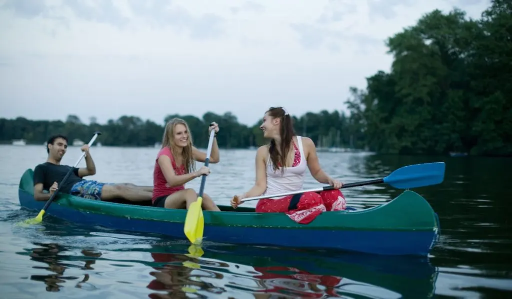 canoers in a peaceful river