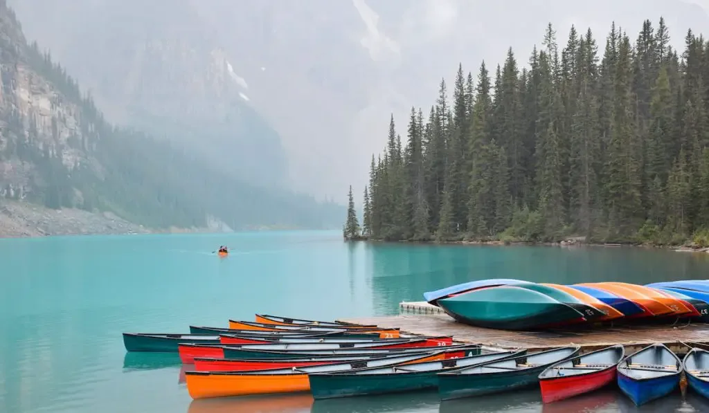 colorful canoes at the dock